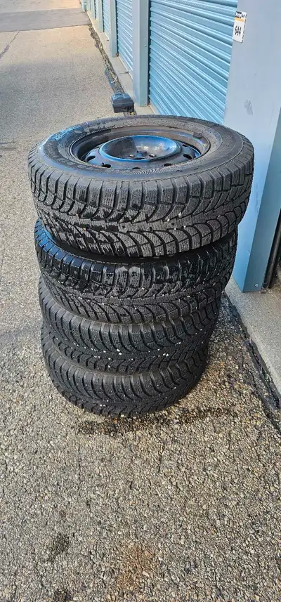 Set of Four Winter Wheels. Tires are Champiro Ice Pro 215/70/R15 10/32nds Or 95% tread life remainin...