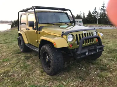 2008 Jeep Sahara, Rescue Green with just over 136k km. B.C. Jeep, only driven in summer, minimal rus...