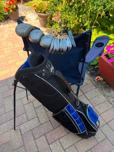 Left set of golf clubs & bag, View more