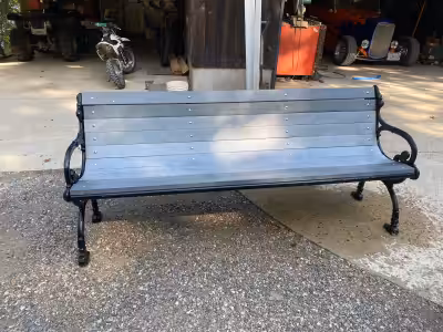Heavy duty outdoor bench. Purchased from Uline. Recycled plastic plank, never have to seal or paint....