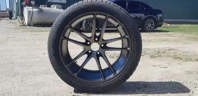 4 wheels . One extra tire . 5x 120 . 20 inch 295 tires