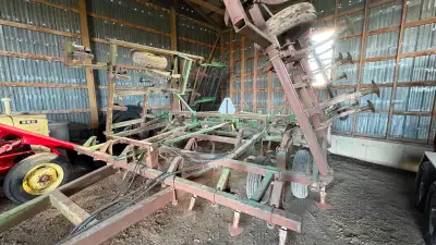 For sale - John Deere 920 Cultivator, 25.5 width (feet), It has leveling tines and knockoff sweeps....