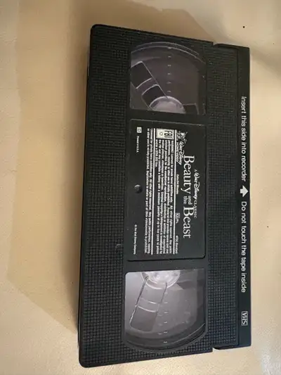 Relive a tale as old as time with this classic Beauty and the Beast VHS tape! This is a used VHS cop...
