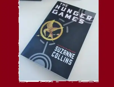 Winning means fame and Fortune… Losing means certain Death… Welcome to the Hunger Games… Popular Suz...