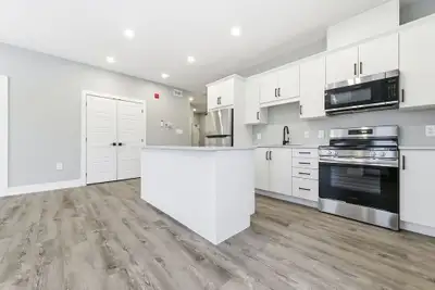 Main floor accessible two bedroom two bathroom unit with in floor radiant heat and water included. A...