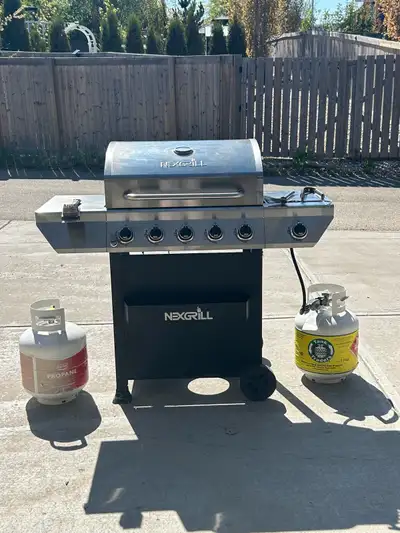 Ready to BBQ - complete set up Nexgrill 5 burner propane barbeque with cover, utensils, and two prop...