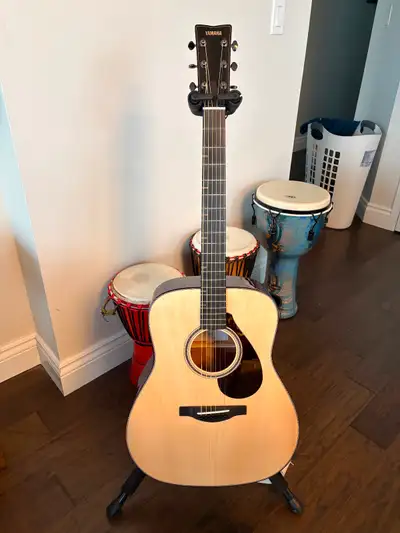 Brand new purchase from Cosmo Music. The Yamaha FG9 M is a handcrafted, premium dreadnought acoustic...