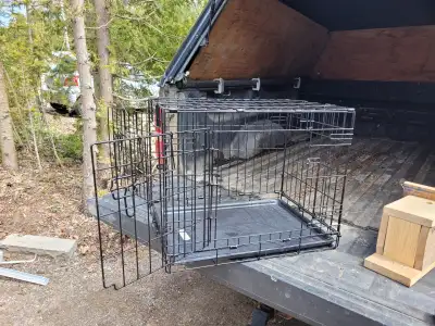 New Dog Crate in excellent condition. Size 23.5" deep x 16.75" wide x 18.75" high $40 obo pick up in...