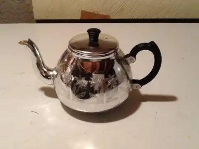 VINTAGE POLISHED ALUMINUM TEA POT. 219, View more