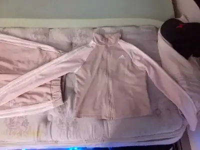 New Adidas light pink tracksuit Please contact me for a drop off location Need gone as soon as possi...