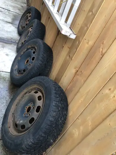 4 General Altimax snow tires on rims. Bolt Pattern 5X100 185-65R15 Tires in good condition. I sold m...