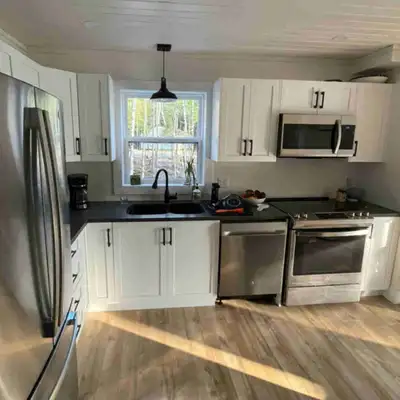 Find your serenity at "The Dove," a modern 2-bedroom home nestled in the woods just 20 minutes from...