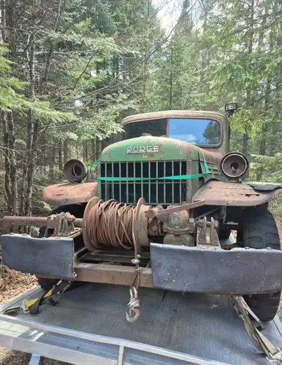 This classic Dodge Power Wagon is a vintage project truck, perfect for a restoration enthusiast look...