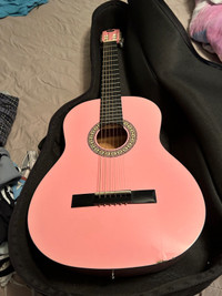 Pink acoustic guitar