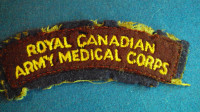 ROYAL CANADIAN ARMY MEDICAL CORPS = CLOTH SHOULDER TITLE