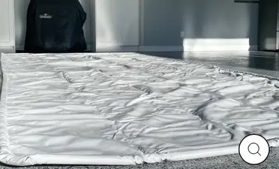 Looking for a couple of garage floor containment mats . Thanks