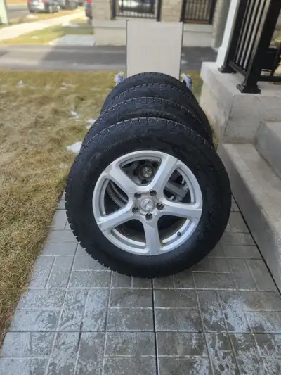 4 Slightly used BRIDGESTONE BLIZZAK 235/65/R17 on Alloy RIM 95 percent tread DOT 2023 C$575