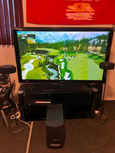 58 Sony plasma tv with stand Bose speakers & Sub woofer.