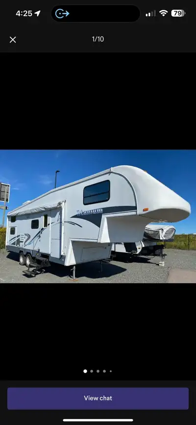 Fifth wheel titanium camper 28 feet long bed in the front Full bathroom at the back two bunk beds fo...