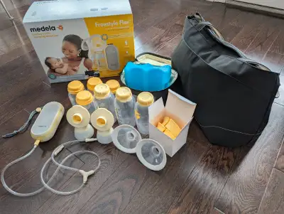 Gently used breast pump Comes with additional accessories (carry bag, cooler bag with freezer insert...