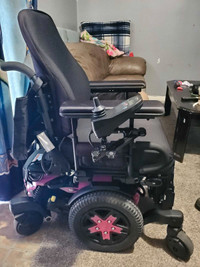 Power Wheel Chair with Battery Charger.