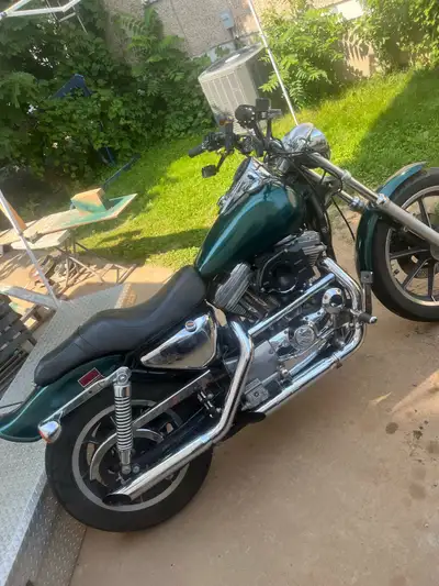 Get ready to hit the road with this classic, pre-owned Harley-Davidson Sportster that offers a fanta...