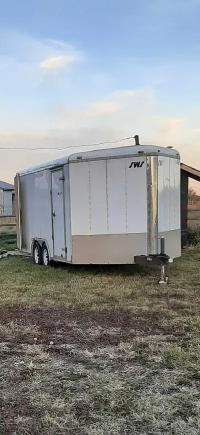 2010 forest river. 20ft X 8 ft cargo trailer. Good tires and spare. Sold built rack down driver side...