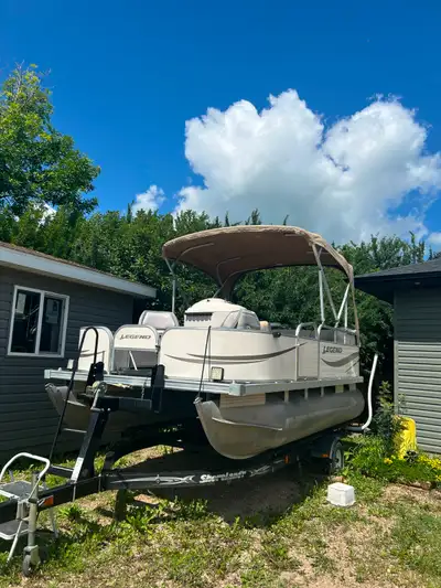 2007 Legend Genesis 16 foot Pontoon with Shorelandr Trailer and 50 HP Merc 2 stroke oil injected. Si...