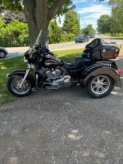 Harley Triglide with low milage 38817. Front brakes are new and rear are in excellent condition. All...