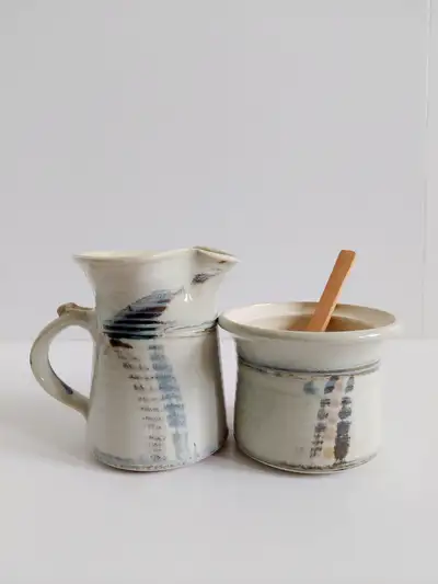 Set of 2, studio pottery milk and sugar containers, signed, View more