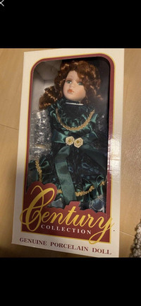 New in box porcelain doll
