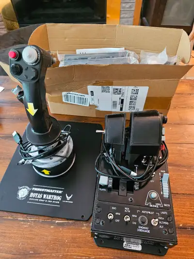 Very lightly used. Heavy duty HOTAS. Includes desk mount (new in box)
