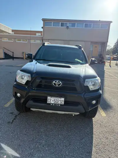2015 Tacoma with leer bed cover & remote starter. Drives like a dream and has absolutely ZERO issues...