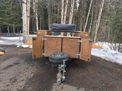 U-Built Utility Camping Trailer, storage on sides and in front. Smittybilt roof top tent for camping...