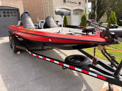 This pre-owned Stratos bass boat is a high-performance fishing machine, fully equipped with a Minn K...
