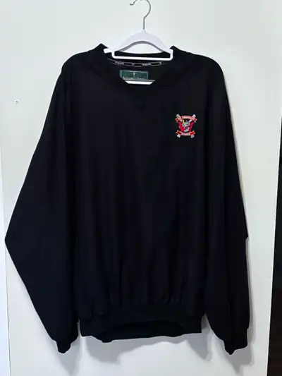 Selling a gently used Alexander Street Tosani pullover in size XL. It's black and features a 10th An...