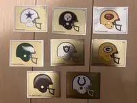 Eight 1988 Panini NFL football helmet stickers