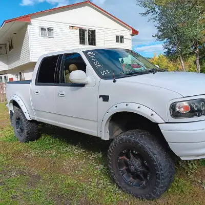 2002 king ranch 2wdr 6 inch lift LED lights all around plus blue led lights inside Trailer brakes ho...