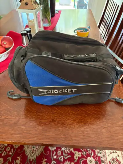 Joe Rocket bag in good condition. No magnets held on by bungee cords.