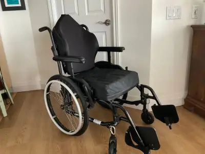 Black coloured, Helio A7 Wheelchair for sale, gently used, the location is in Pickering Seat width 1...
