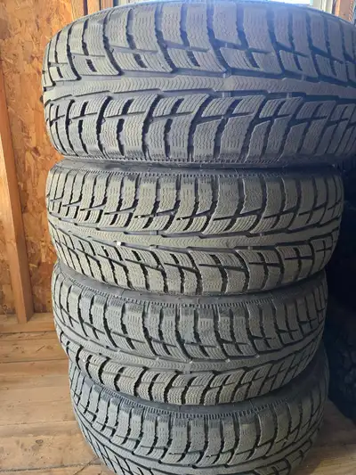 A set of BFG winter T/A tires. 235/55/20. 3/4 life left. $450