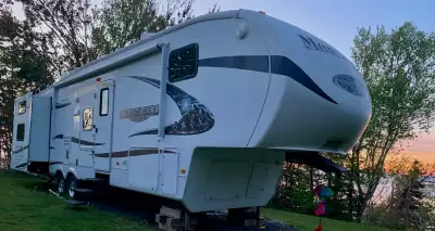 This home away from home sleeps 9. Master upstairs has queen bed with full bath and cedar lined clos...