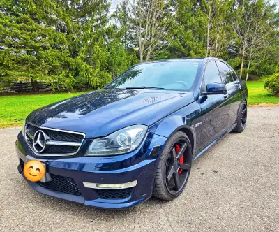 2012 MB AMG C63 sedan Clean title, rare midnight blue metallic paint with black leather interior. Fu...