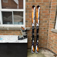 166 Salomon ski with boots 
