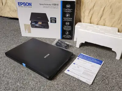 I'm offering an Epson Perfection V39 II scanner, known for its high-resolution scanning capabilities...