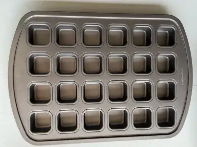 I'm selling 2 Pampered Chef brownie pans! One is the brownie pan and the other is the brownie bite p...