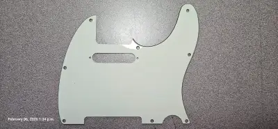 Available is a good condition “8 Hole Tele Pickguard” made for most American/Mexican Fender style te...