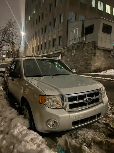 2010 Ford Escape XLT with under 120,000 km. This model offers reliable all-wheel drive (4x4) paired...