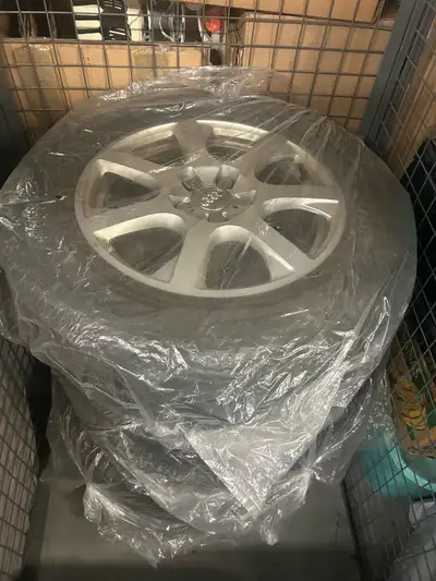 Audi OEM RIM with winter tired on them. Tired is a bit old, but rim in good condition. Rims will fit...