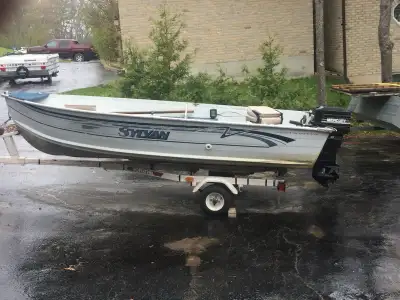14’ Sylvan fishing boat with 25 hp mercury motor. Boat and motor are in excellent shape, flat floors...